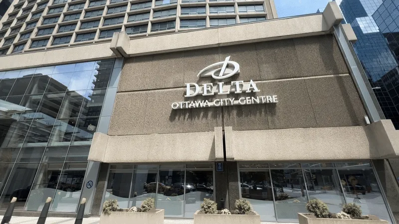Delta Hotels Ottawa City Centre exterior signage on the hotel facade in downtown Ottawa