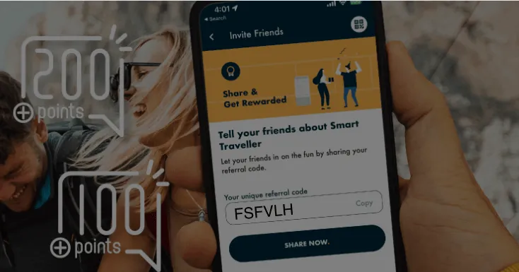 Smart Traveller referral code screen on mobile phone with 2000+ points offer visible on card in background