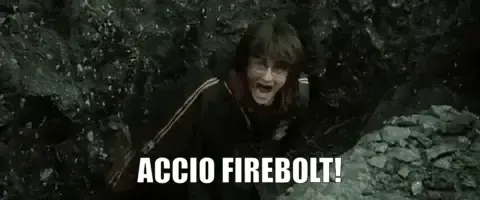 Person in dark robes among rocky terrain with "ACCIO FIREBOLT!" text overlay