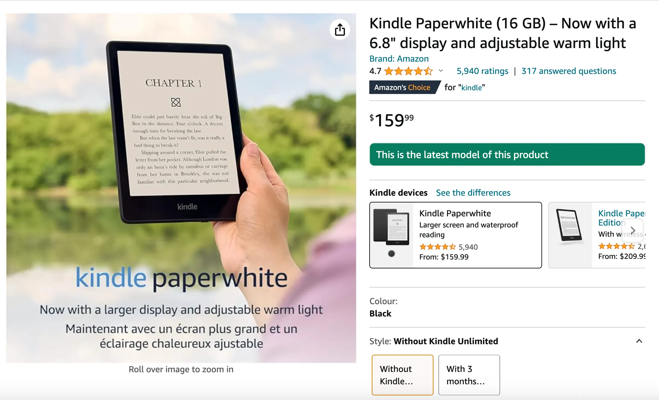Amazon Kindle Paperwhite e-reader displaying Chapter 1 text, held in hand against green outdoor background