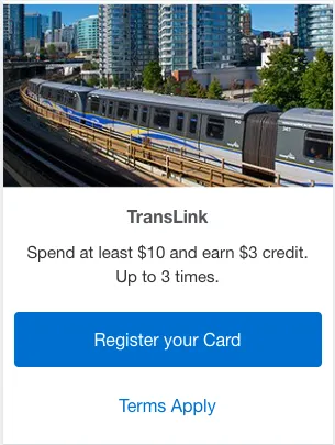 TransLink Vancouver SkyTrain train on elevated track with downtown city skyline in background