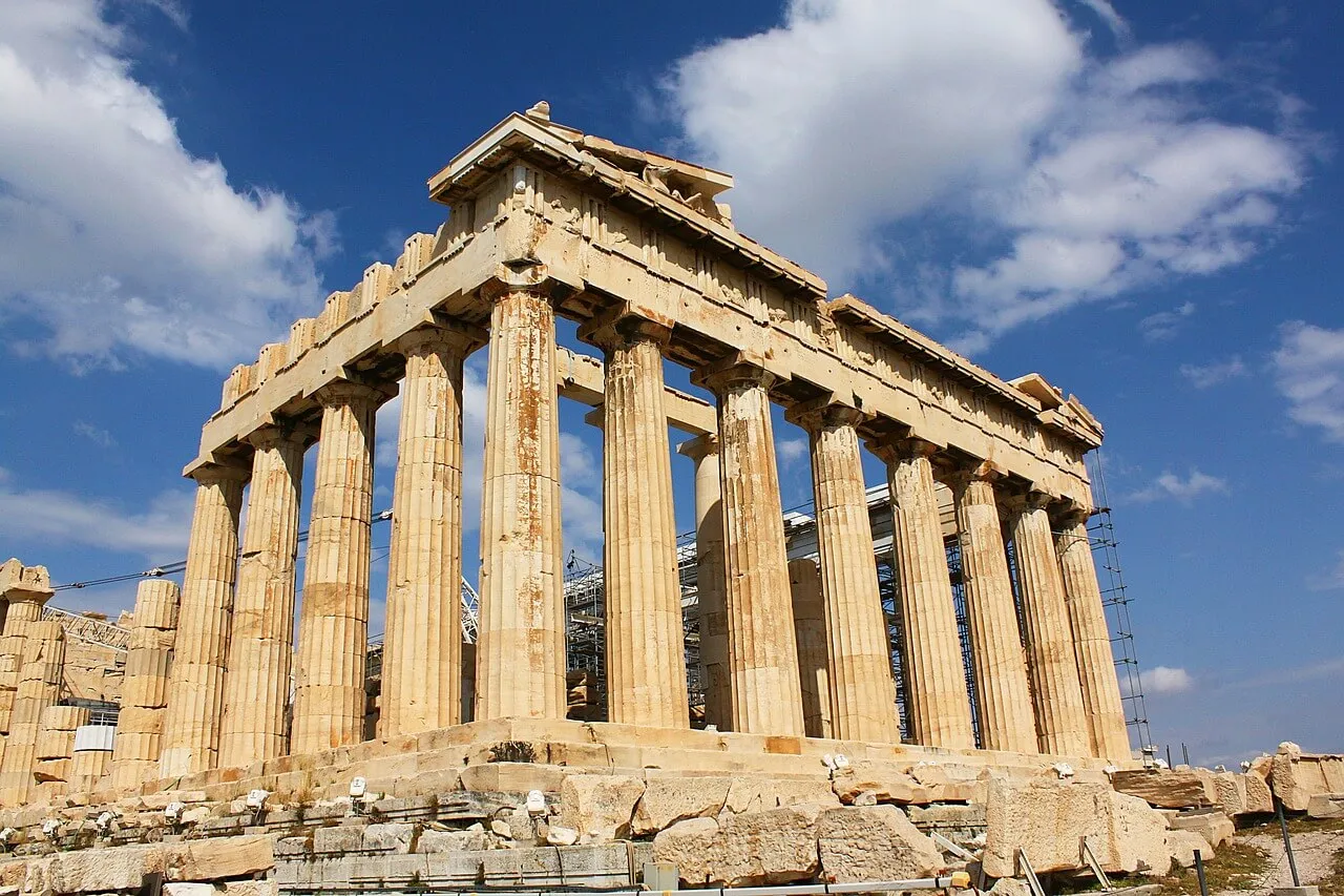 Parthenon ancient Greek temple with Doric columns against clear blue sky, Athens